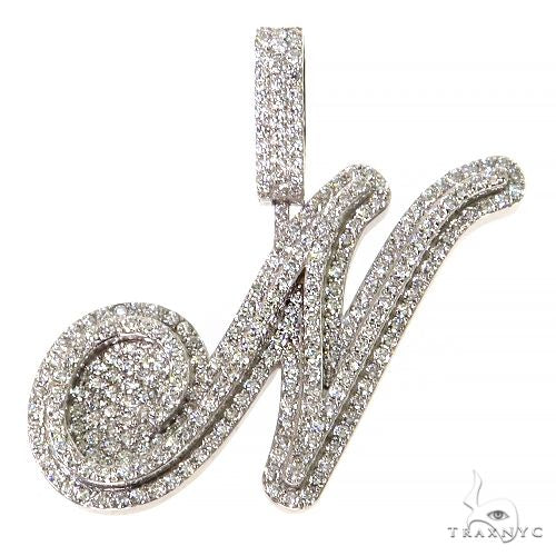 Diamond-encrusted initial "N" pendant in white gold with pave setting, elegant design