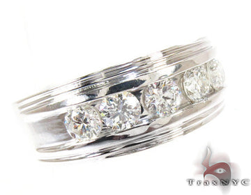 Yellow gold men's wedding band with five round channel-set diamonds inlaid horizontally
