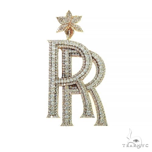 Diamond double initial pendant in 14k gold with flower bale detail, front view