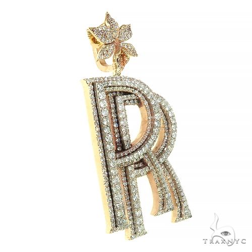 Double initial pendant "RR" adorned with diamonds and a diamond-studded flower bale in white gold