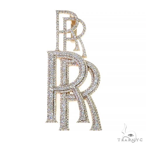Double initial diamond pendant in 14k gold with floral diamond accents between two block letters — front view