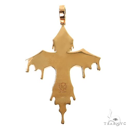 Yellow gold drip cross pendant with smooth polished finish and custom detailing on back