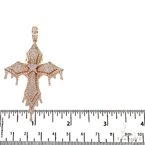 Rose gold drip cross pendant with diamond accents and hanging diamond drops, 2.5 inches tall
