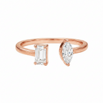 Rose gold open ring with emerald-cut and marquise diamonds on each end.
