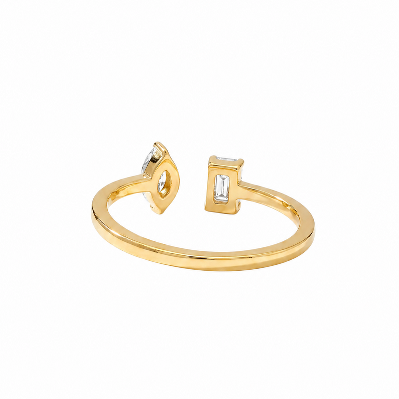 Gold open ring with two small diamond-shaped gemstones at each end.