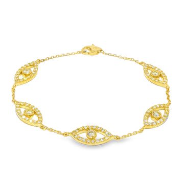 Gold bracelet with evil eye motifs adorned with yellow diamonds and clear stones.