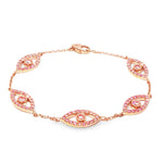 Rose gold evil eye bracelet with pink diamonds and delicate chain links.
