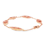 Rose gold evil eye bracelet with pink diamonds and delicate chain links.