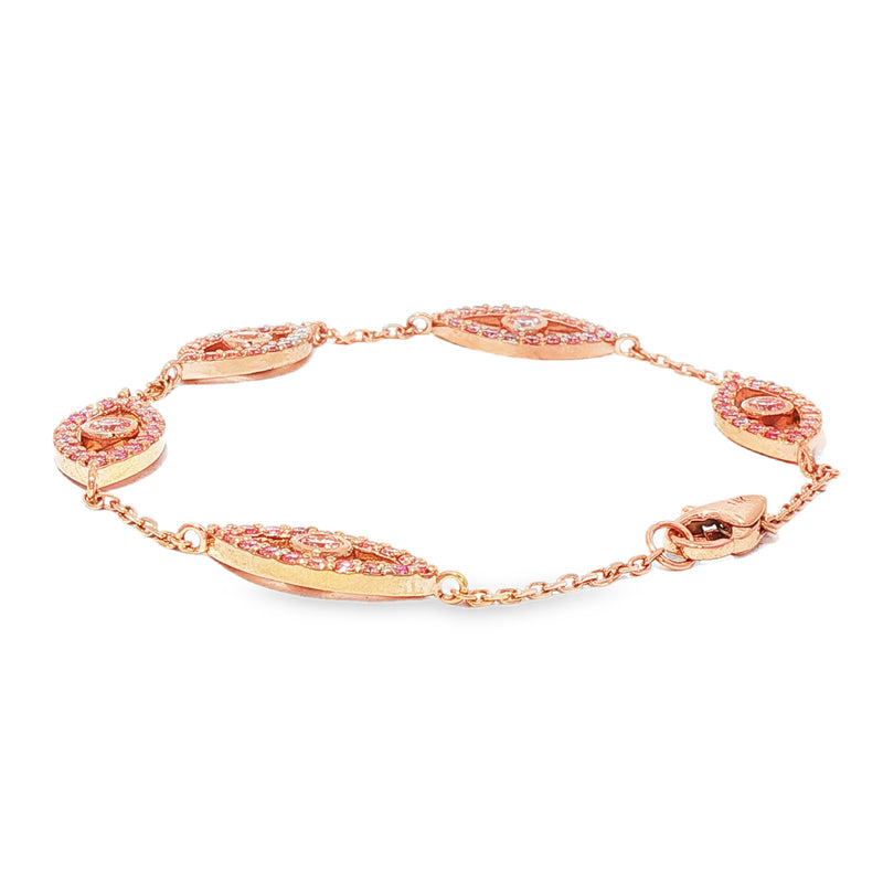 Rose gold evil eye bracelet with pink diamonds and delicate chain links.