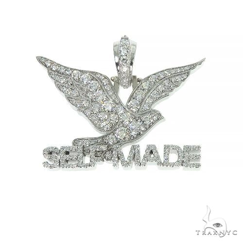 Diamond charm pendant in polished metal – round-cut diamond-set freebird motif, front view