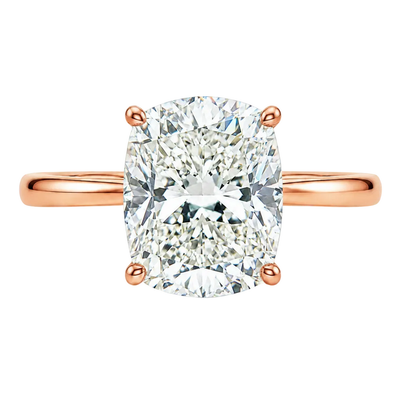 14K gold elongated cushion lab grown diamond engagement ring with a 2.50 carat center stone, four-prong cathedral setting, and slim 2.00mm band.