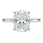 14K gold elongated cushion lab grown diamond engagement ring with a 2.50 carat center stone, four-prong cathedral setting, and slim 2.00mm band.