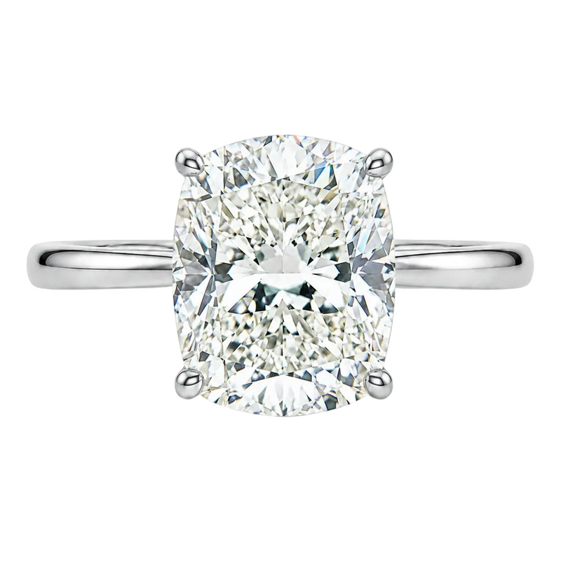14K gold elongated cushion lab grown diamond engagement ring with a 2.50 carat center stone, four-prong cathedral setting, and slim 2.00mm band.