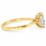 14K gold elongated cushion lab grown diamond engagement ring with a 2.50 carat center stone, four-prong cathedral setting, and slim 2.00mm band.