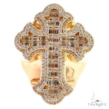 Yellow gold men's ring with emerald cut diamond cross and surrounding smaller diamonds.