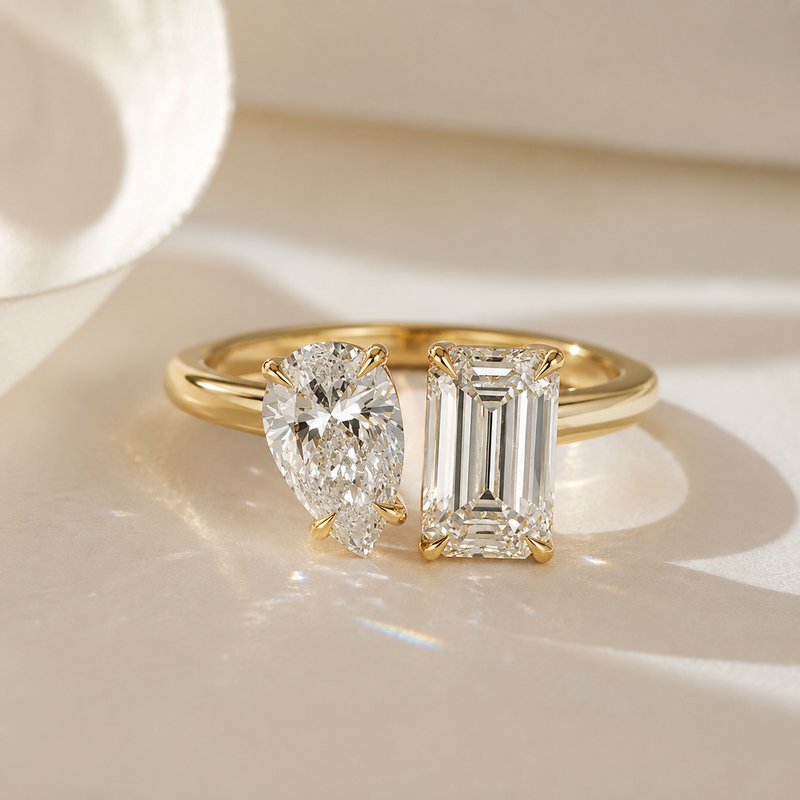 14K gold Toi et Moi engagement ring with pear and emerald cut lab grown diamonds