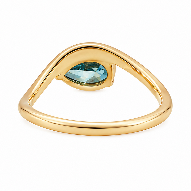 Yellow gold ring with pear-shaped vivid blue diamond solitaire centerpiece