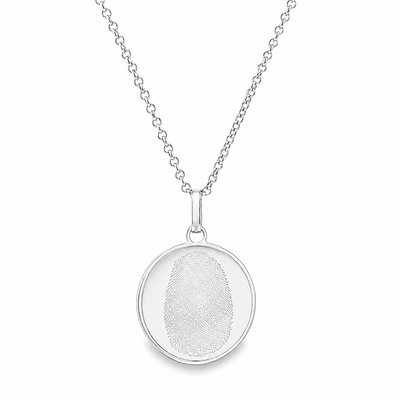 Silver round pendant necklace with detailed fingerprint engraving on delicate chain.