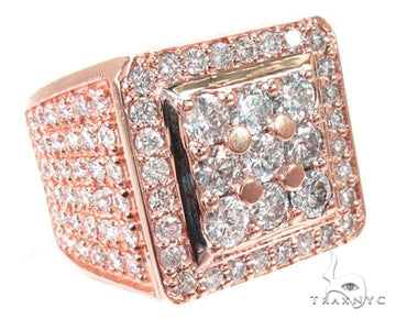 Men's 10k rose gold diamond ring with round-cut stones set across the band, angled three-quarter view