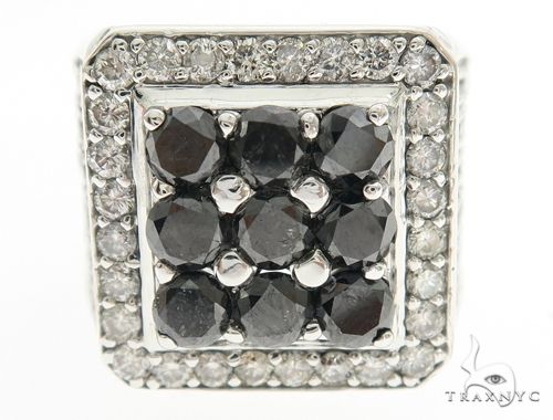 Square white gold ring with black diamonds surrounded by small white diamonds