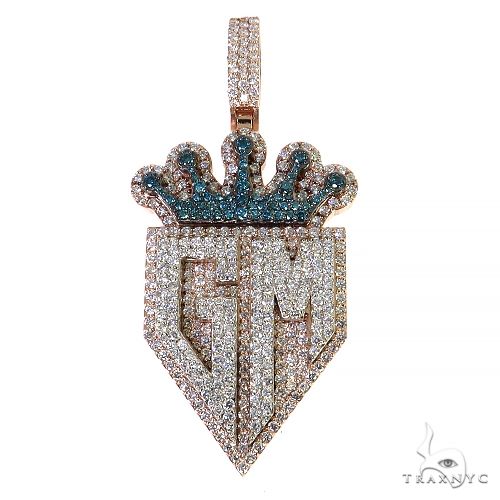 Diamond GM pendant in gold – front-facing view showing stone-set lettering and polished frame