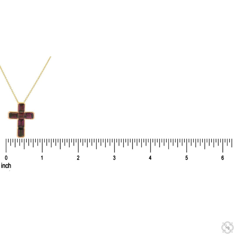 Yellow gold cross pendant set with deep red garnet gemstones on fine chain