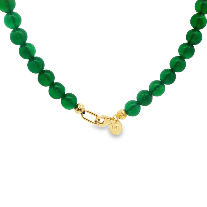 Green gemstone beads necklace with gold clasp and round gold bead accents.