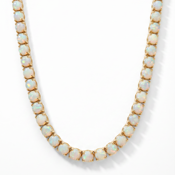 Yellow gold opal tennis chain with round opal gemstones in classic setting.