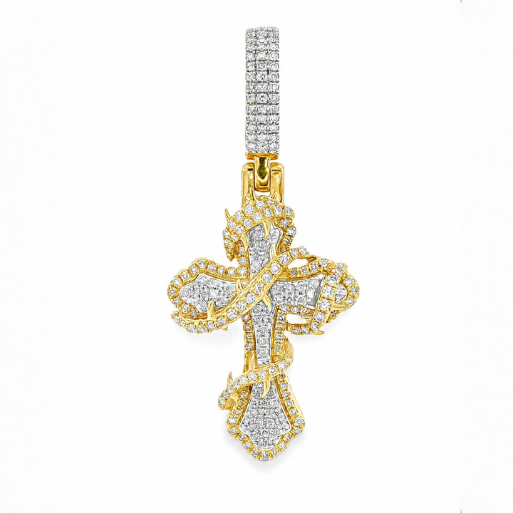 Yellow gold fleur de lis cross pendant with pavé diamonds and thorned detailing.