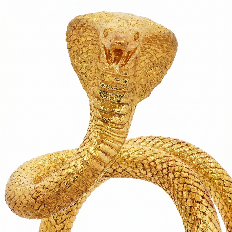 24k gold cobra ring with detailed scales and raised hood design in a coiled pose.