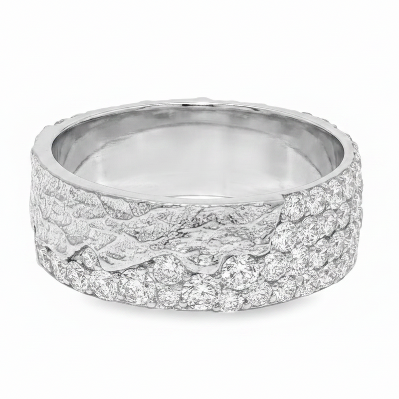 Wide white gold men's wedding band with pave diamonds and textured crisscross detail.