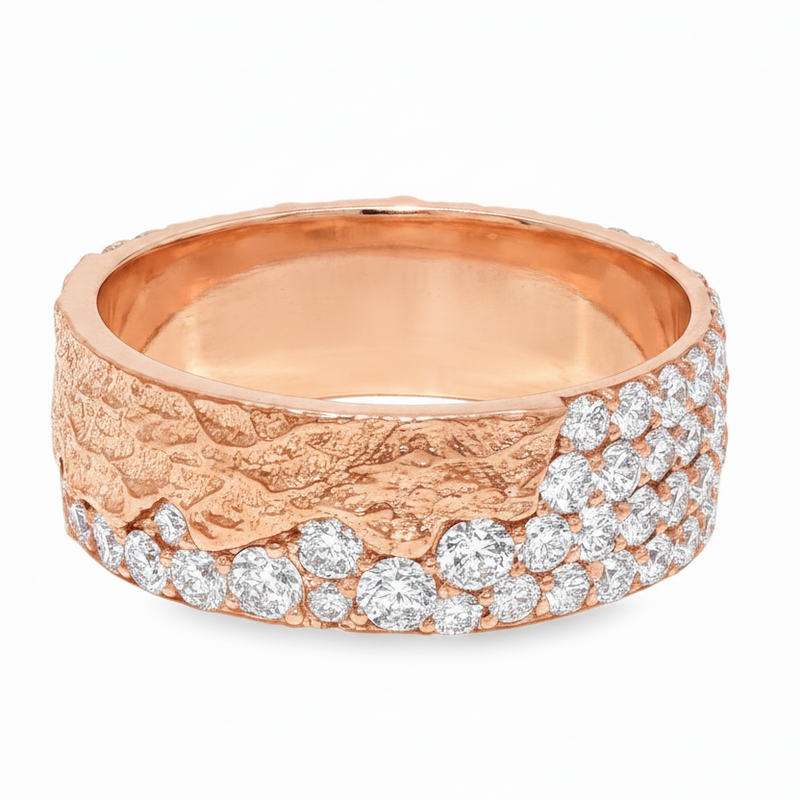 Rose gold men's wedding band with textured finish and scattered round diamonds.