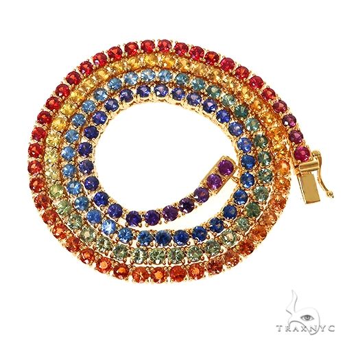 Graduated rainbow sapphire tennis chain in 14k gold – multicolor stones graduating from center, full necklace view