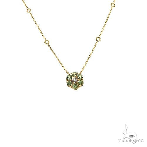 Yellow gold necklace with green sapphire and diamond flower pendant