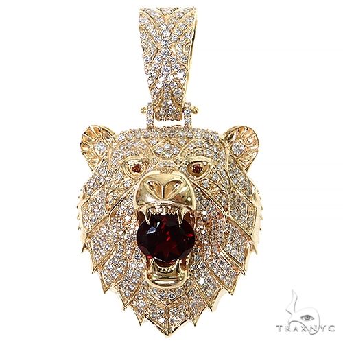 Yellow gold grizzly bear pendant with garnet eyes and diamond accents
