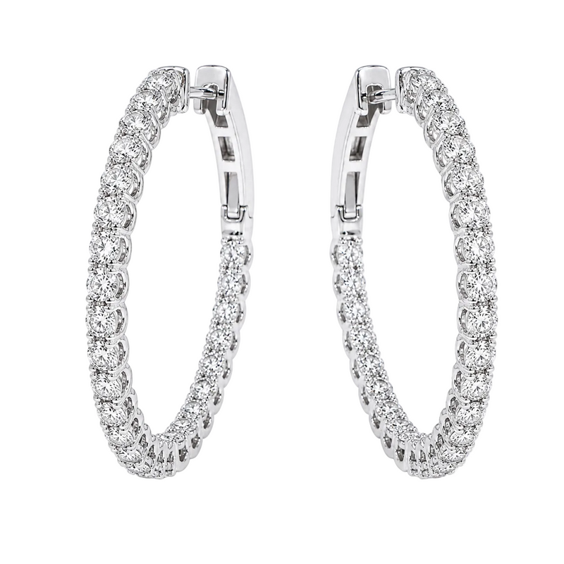 Silver diamond inside-out hoop earrings with sparkling round-cut stones.