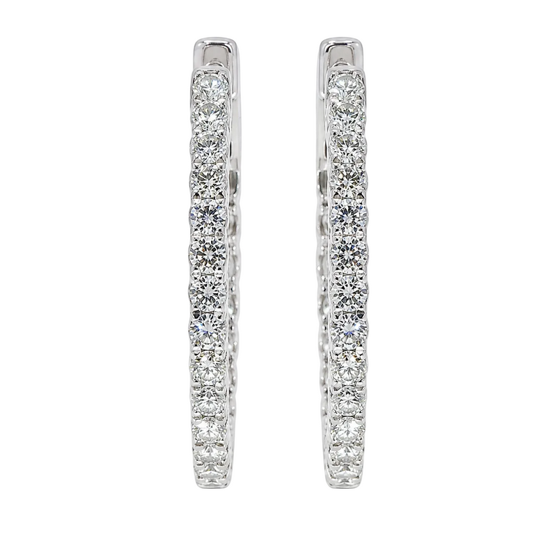 White gold inside-out diamond hoop earrings with channel-set sparkling diamonds.