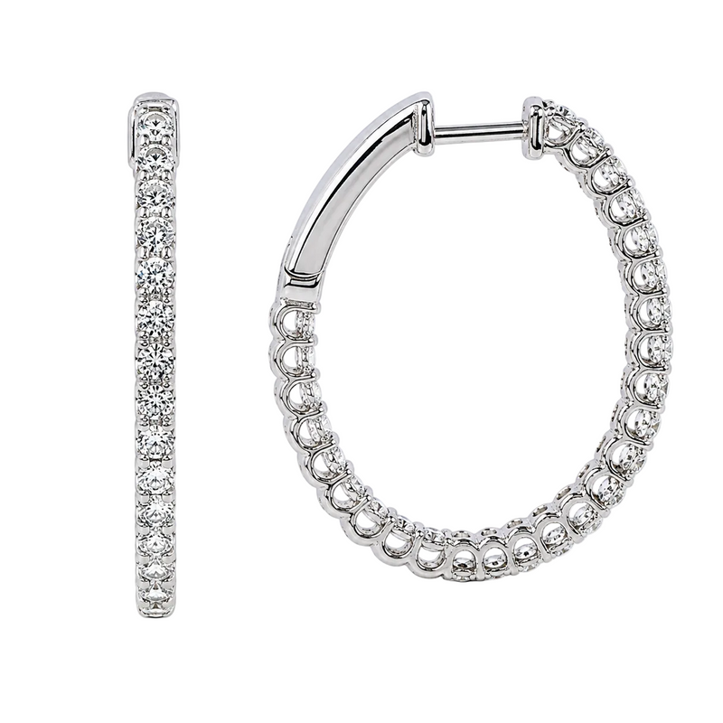 Silver diamond inside-out hoop earrings with sparkling round-cut stones.