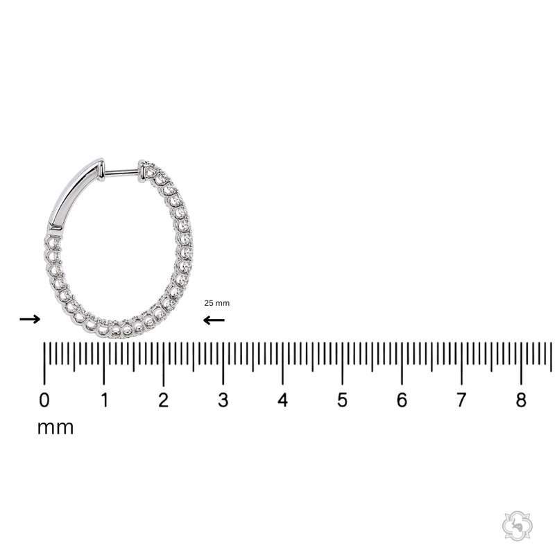 Silver inside-out diamond hoop earrings with secure latch clasp, 25mm diameter.