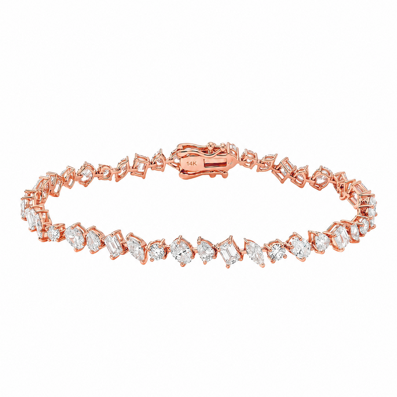 Rose gold bracelet with alternating round and square diamonds in a linked design.