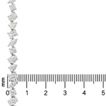 Silver bracelet with assorted diamond shapes, displayed alongside a millimeter ruler for size.