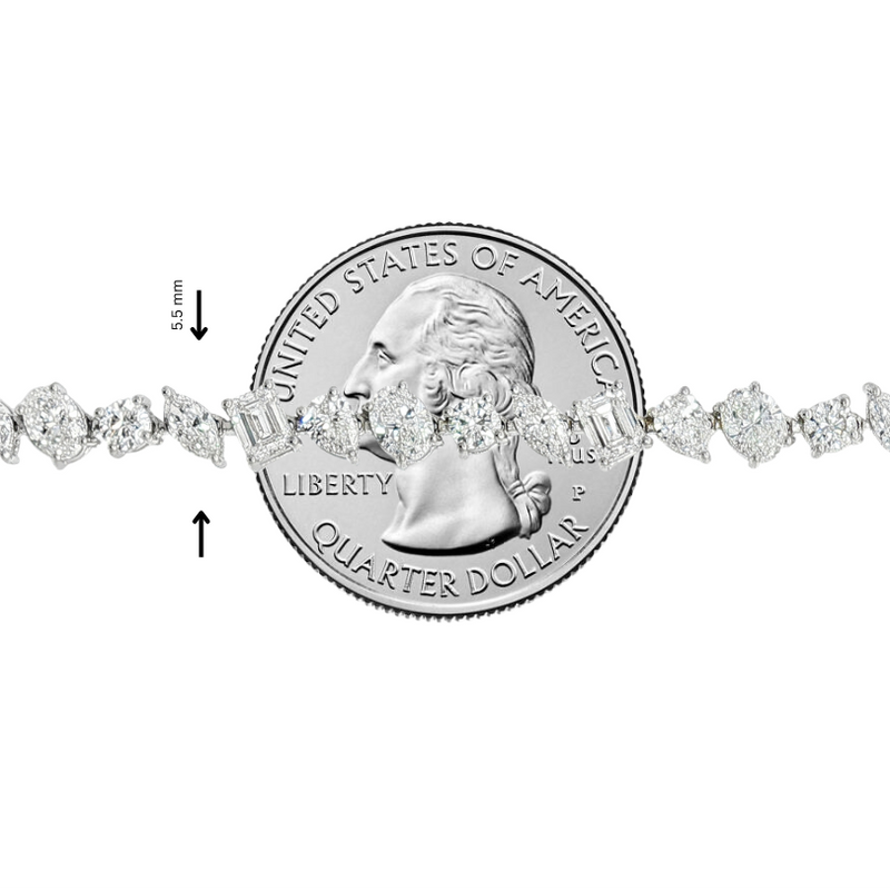 Delicate silver bracelet with alternating round and marquise diamonds, shown beside a quarter for scale.