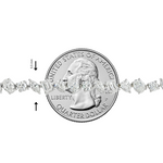 Delicate silver chain necklace with small round diamonds in a continuous pattern.