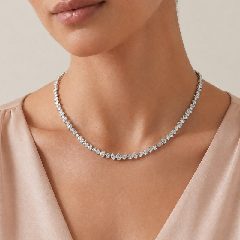 Delicate silver chain necklace with round sparkling diamonds, elegant and refined design.