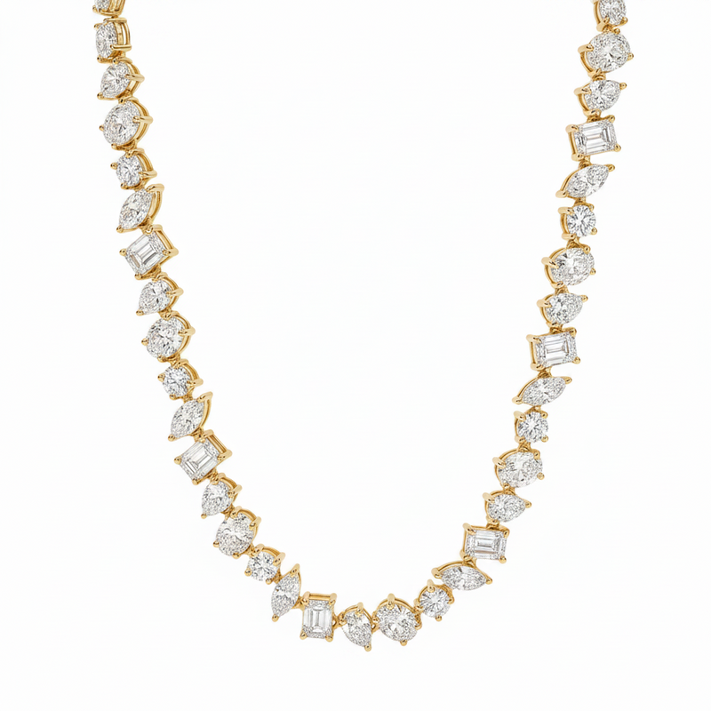 Yellow gold necklace with alternating round and square diamonds in a chandelier style chain.