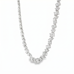 Silver chain necklace with alternating round and square diamonds in a symmetrical pattern.