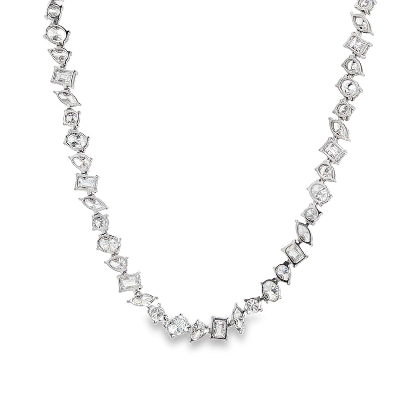 White gold chain necklace with alternating round and square diamond settings.