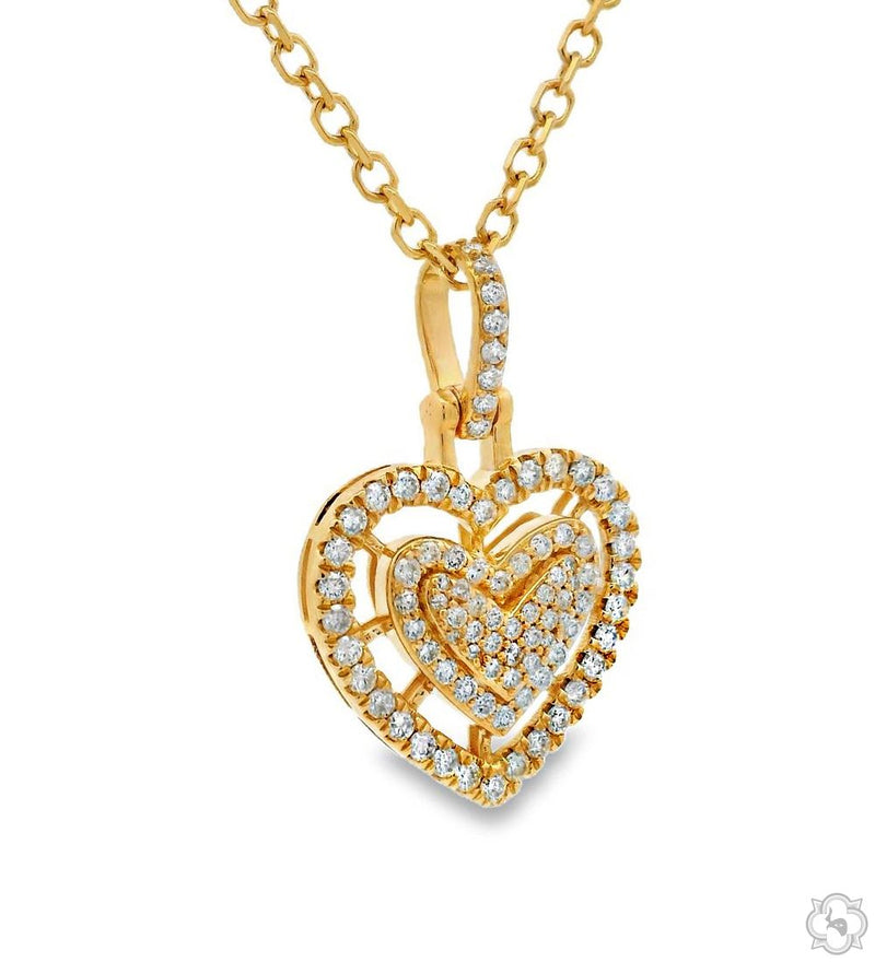 Yellow gold heart-shaped necklace with sparkling diamonds on delicate chain