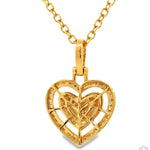 Yellow gold heart-shaped necklace with sparkling diamonds on delicate chain.