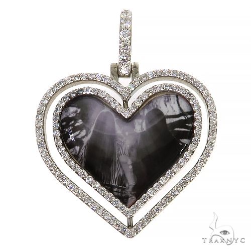 Heart shape spinning photo pendant in 10k yellow gold and rose gold, front view showing rotating heart frame